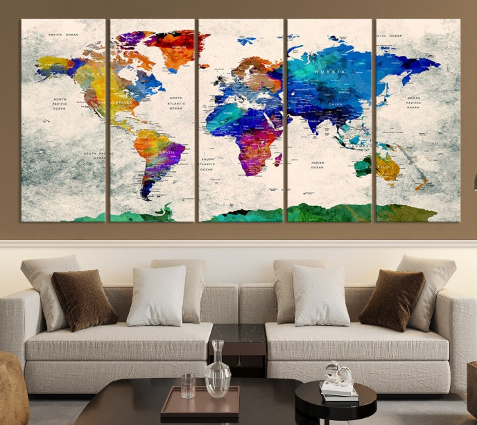 Impression sur toile colorée de carte du monde de punaise