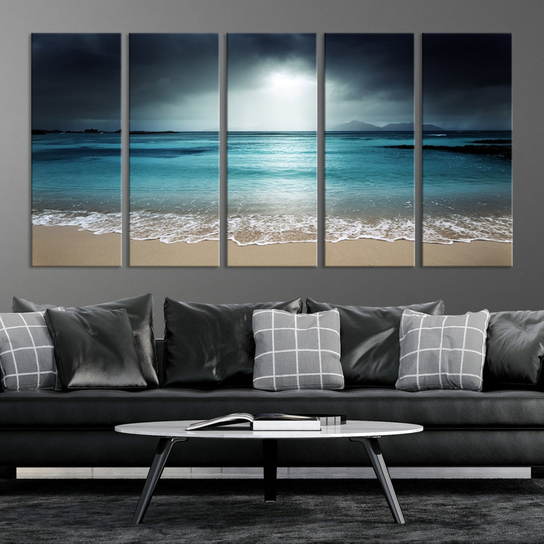 Impression sur toile murale avec plage sombre et océan clair